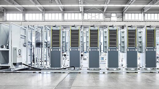 Laminating and pressing line for printed circuit boards and multilayers