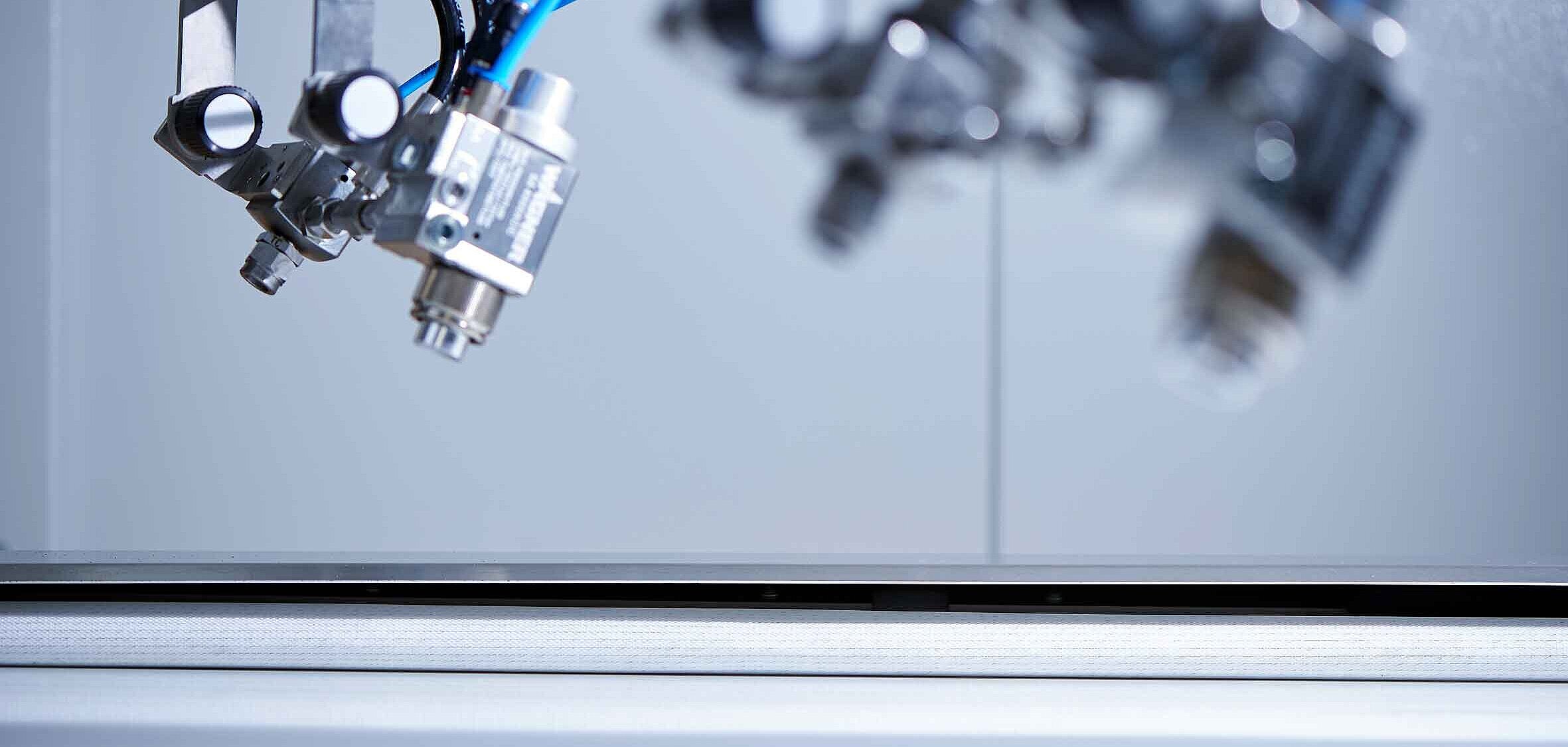 ROBUSpro spray coating machine from BÜRKLE Paint spray pistols